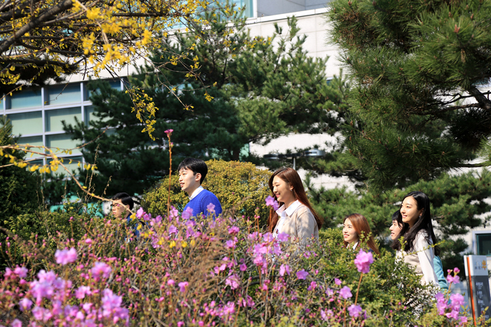 Students with flowers